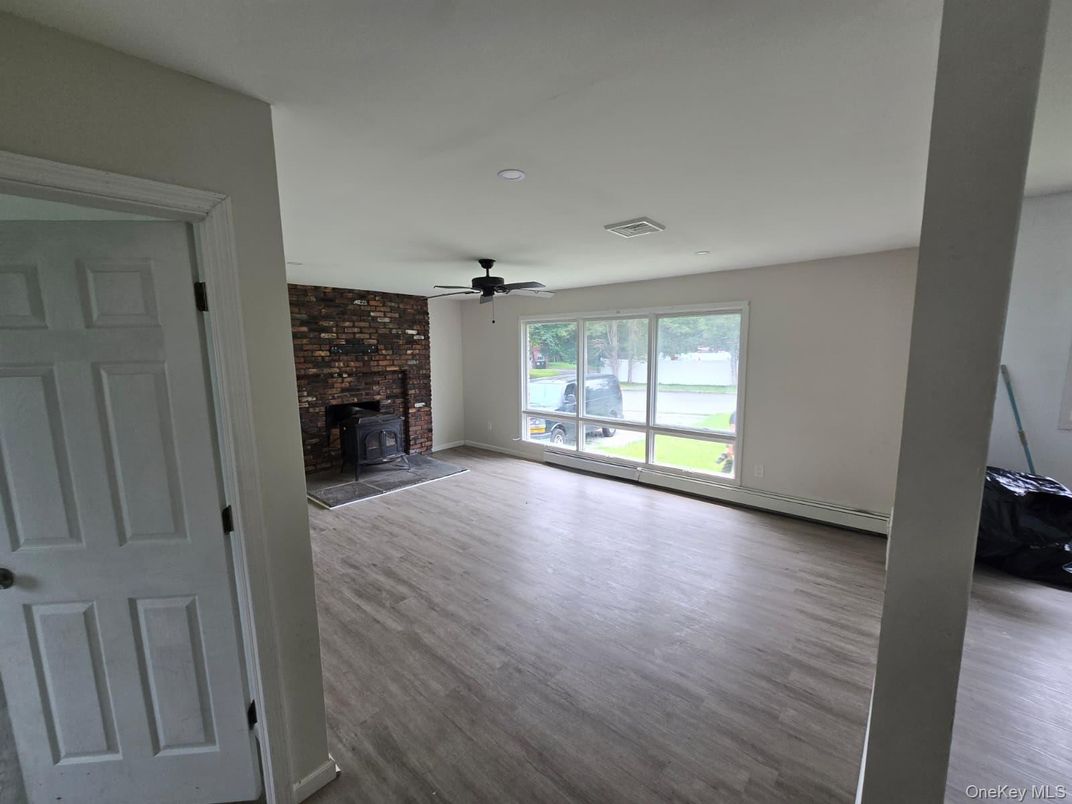 Empty room, Fireplace, Interior, Stone Walls, Wood Texture Flooring