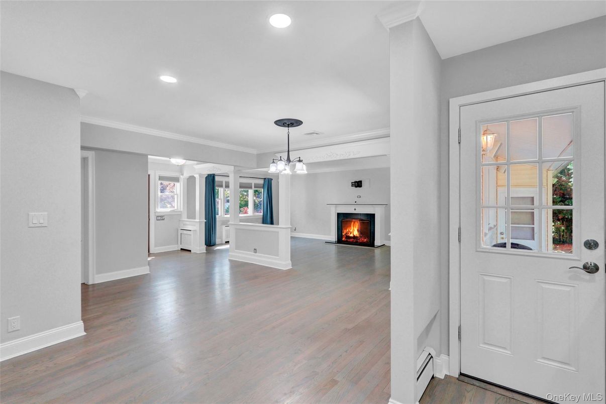 Empty room, Fireplace, Interior, Pendant Lights, Recessed Lighting, Wood Texture Flooring