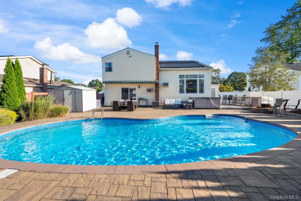 Exterior, Pool, Solar Panels