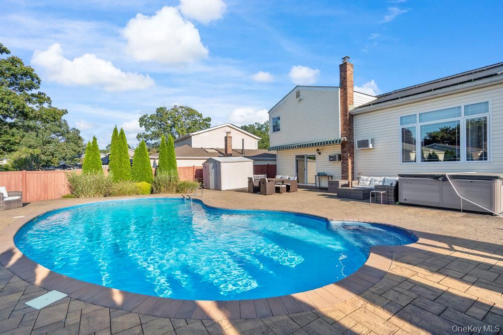 Exterior, Pool, Solar Panels