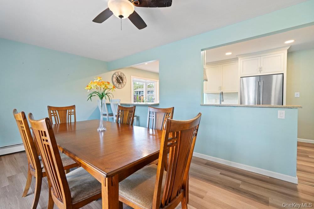 Dining room, Interior, Kitchen, Recessed Lighting, Stainless Steel Appliances, Wood Texture Flooring