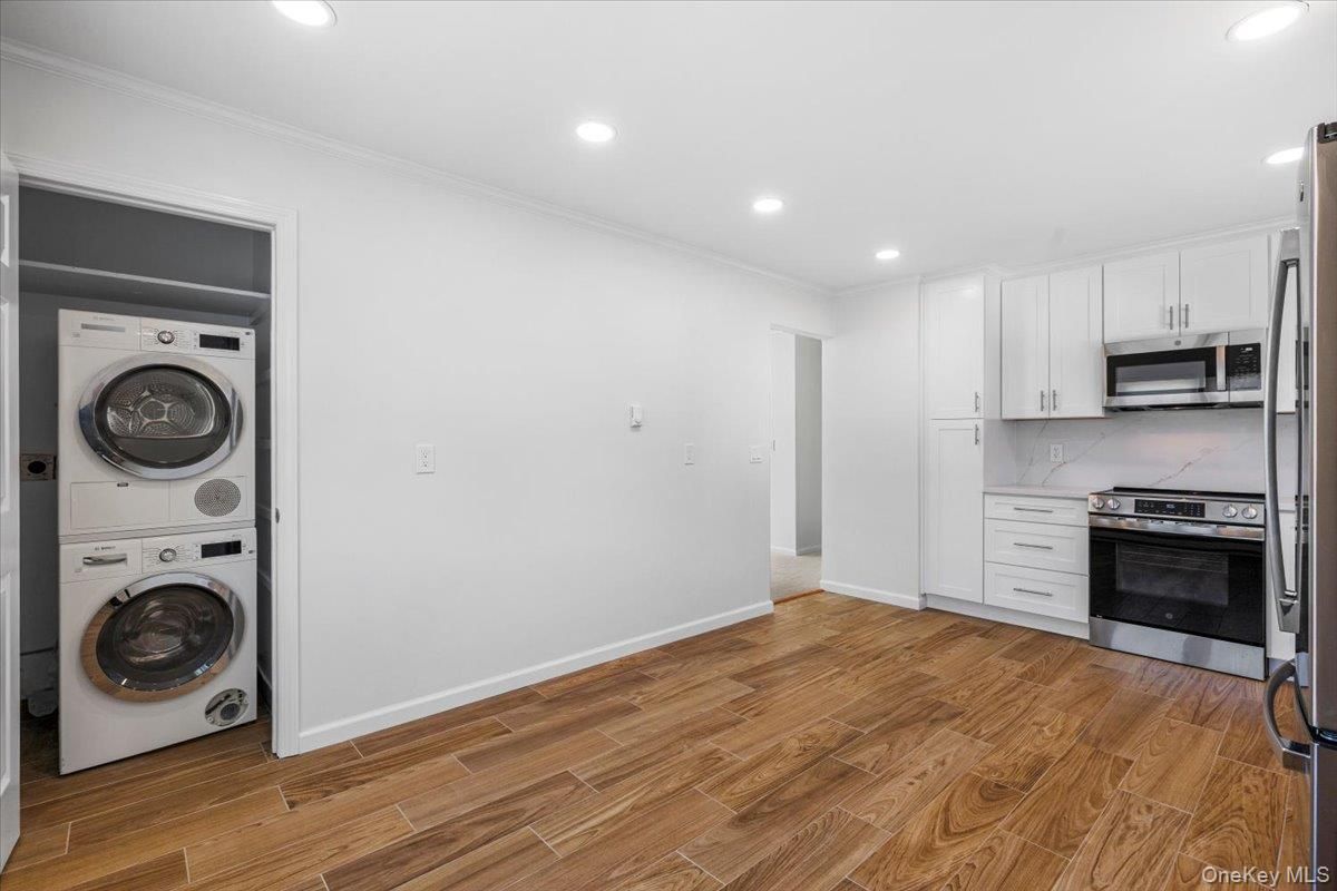 Interior, Kitchen, Recessed Lighting, Utility Closets, Washer, Wood Texture Flooring