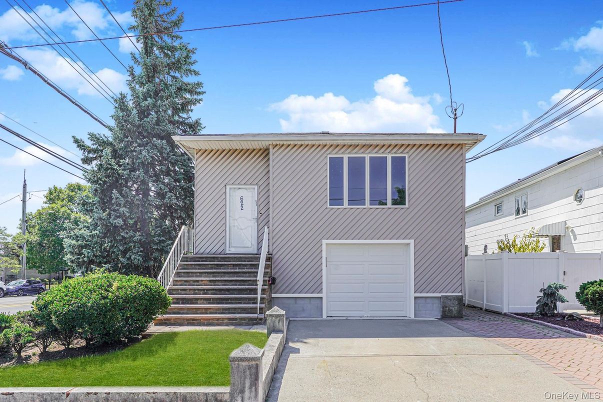 Attached, Exterior, Facade, Raised Ranch