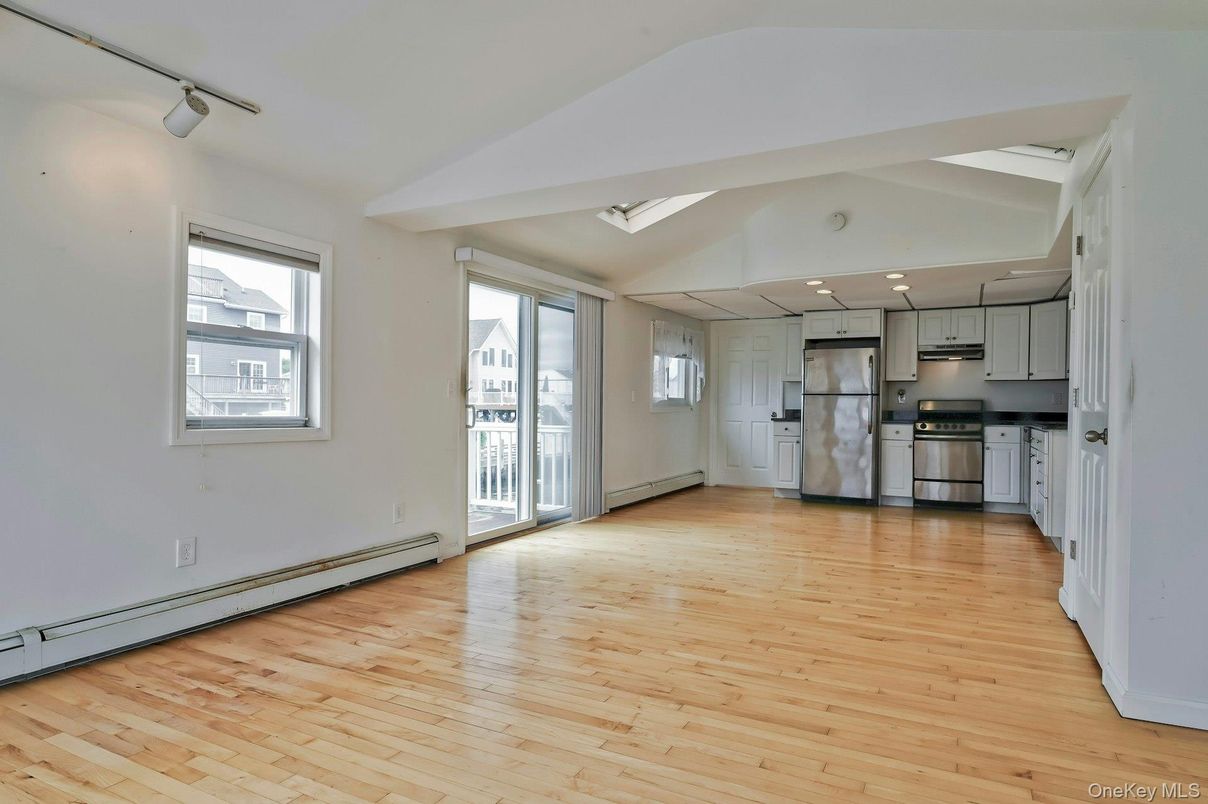 Empty room, Interior, Kitchen, Stainless Steel Appliances, Wood Texture Flooring