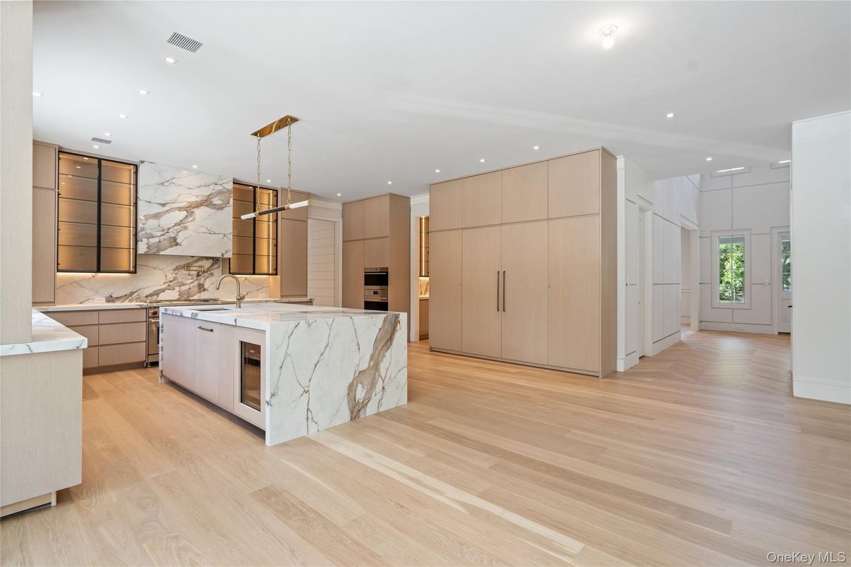 Interior, Kitchen, Marble Walls, Pendant Lights, Recessed Lighting, Wood Texture Flooring
