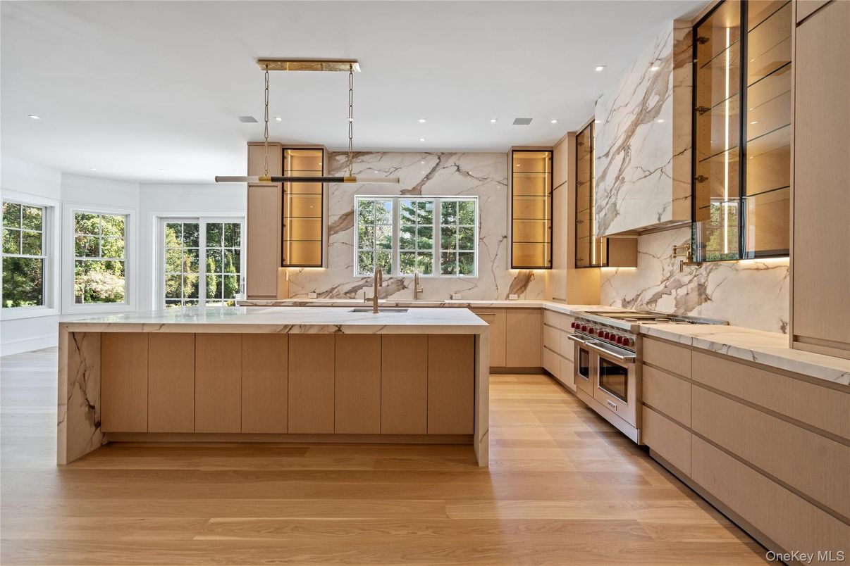 Interior, Kitchen, Marble Walls, Pendant Lights, Recessed Lighting, Stainless Steel Appliances, Wood Texture Flooring