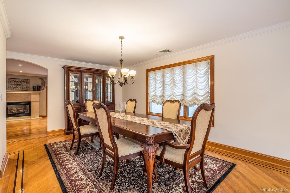 Chandelier, Dining room, Fireplace, Interior, Recessed Lighting, Wood Texture Flooring