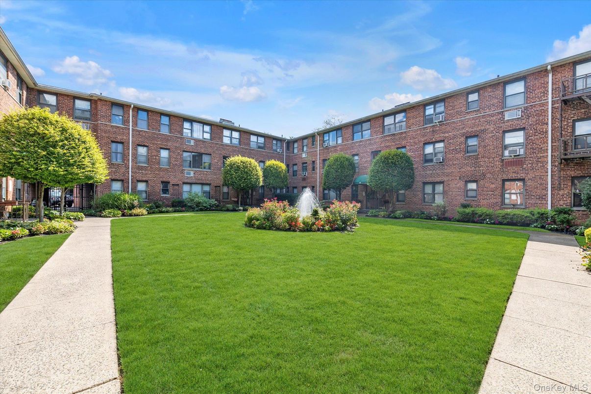 Backyard, Exterior, Facade, Brick Facade, Condo Building