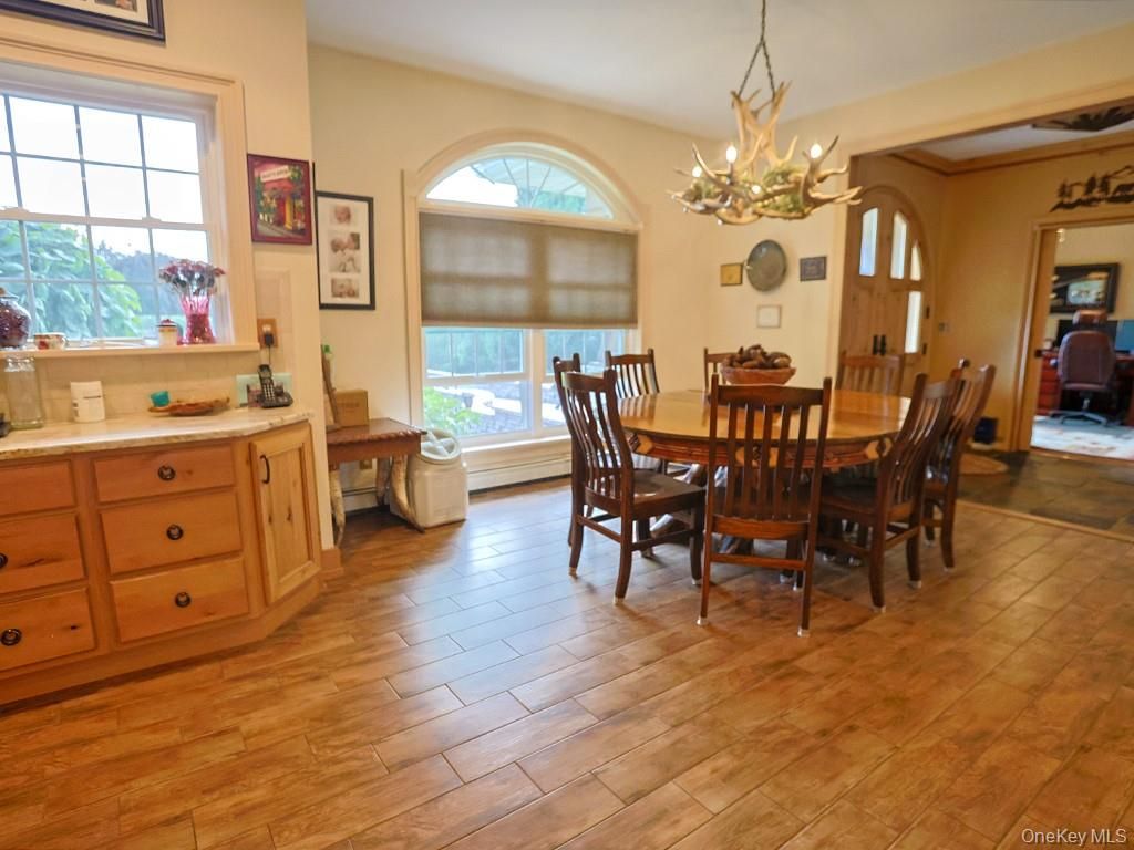 Chandelier, Dining room, Interior, Wood Texture Flooring
