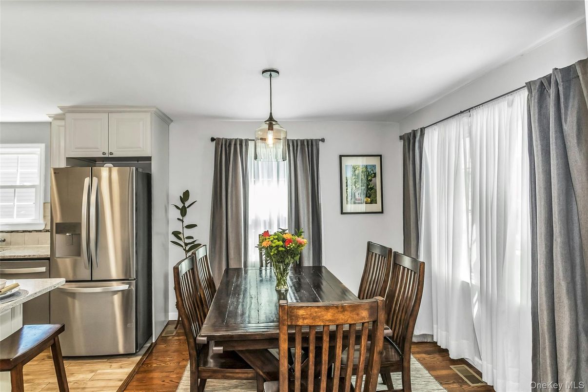 Dining room, Interior, Kitchen, Pendant Lights, Stainless Steel Appliances, Wood Texture Flooring