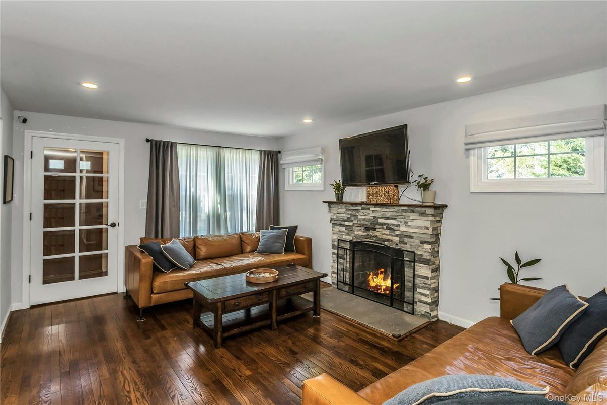 Fireplace, Interior, Living room, Recessed Lighting, Wood Texture Flooring