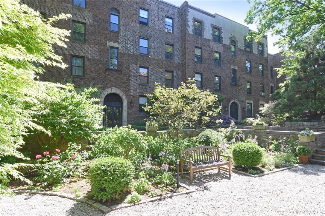 Exterior, Facade, Brick Facade, Condo Building