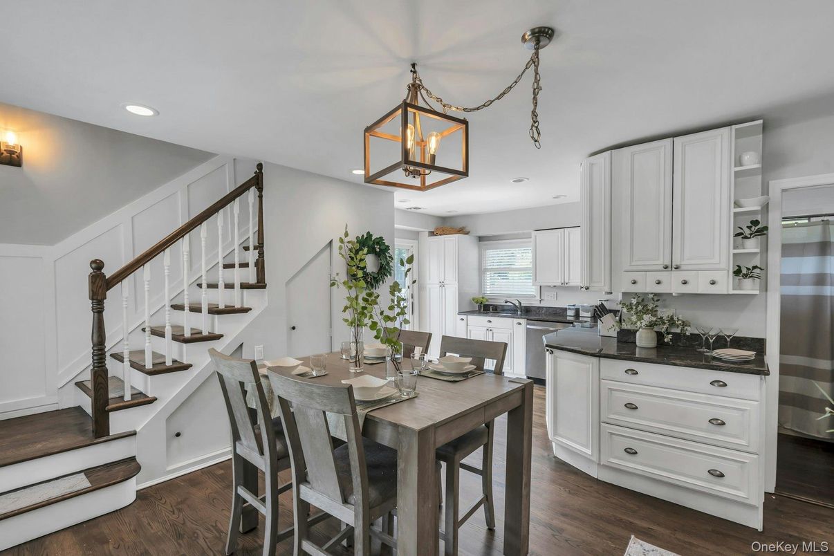 Dining room, Interior, Kitchen, Pendant Lights, Recessed Lighting, Stainless Steel Appliances, Wood Texture Flooring