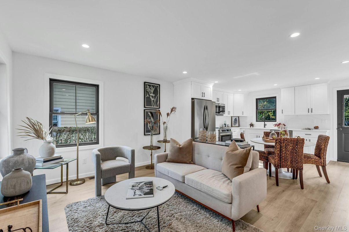 Dining room, Interior, Kitchen, Living room, Recessed Lighting, Stainless Steel Appliances, Wood Texture Flooring