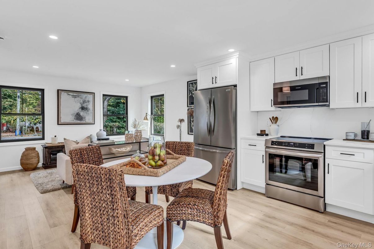 Dining room, Interior, Kitchen, Living room, Recessed Lighting, Stainless Steel Appliances, Wood Texture Flooring