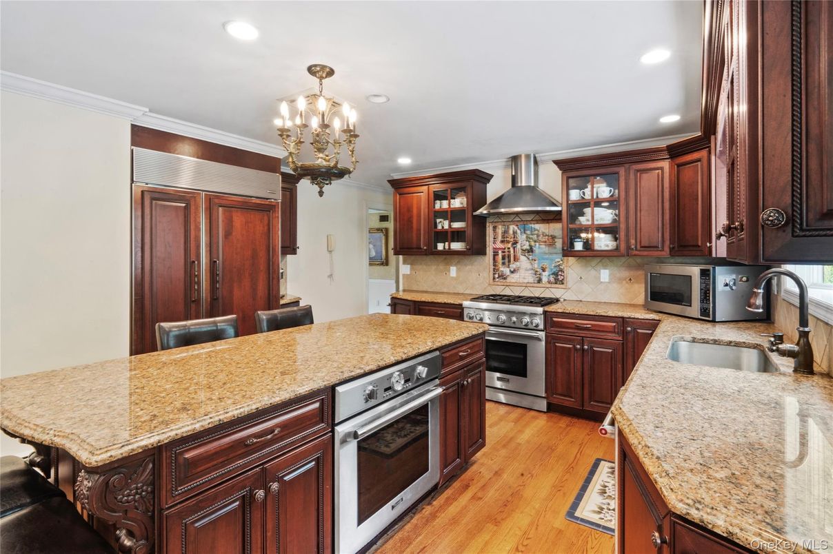 Chandelier, Interior, Kitchen, Pendant Lights, Recessed Lighting, Stainless Steel Appliances, Wood Texture Flooring