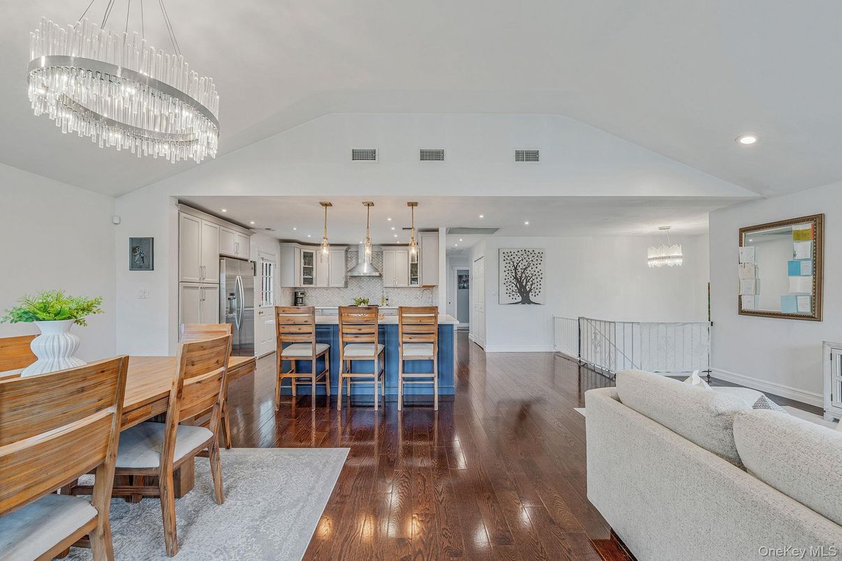 Dining room, Interior, Kitchen, Pendant Lights, Recessed Lighting, Stainless Steel Appliances, Wood Texture Flooring