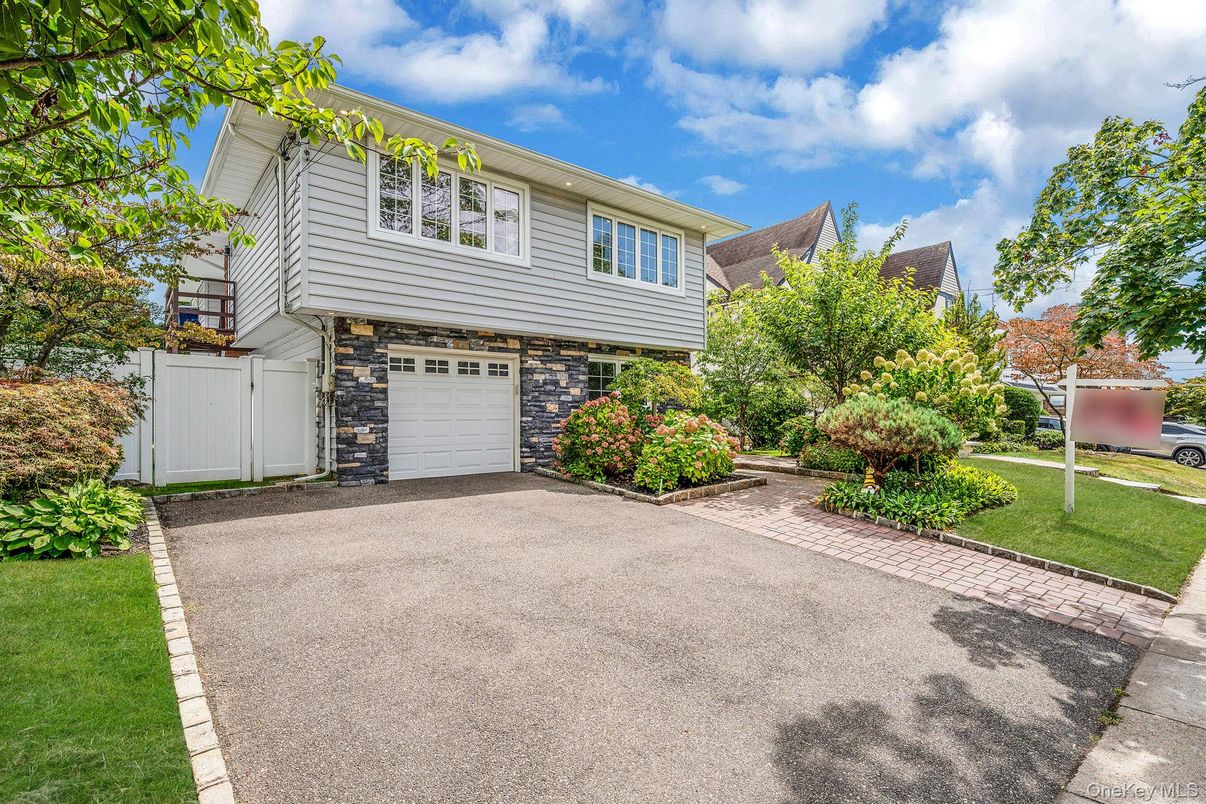 Attached, Exterior, Facade, Raised Ranch