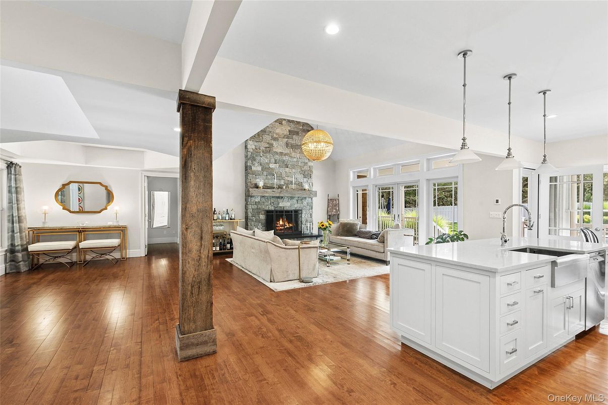 Dining room, Fireplace, Interior, Kitchen, Living room, Pendant Lights, Recessed Lighting, Stone Walls, Wood Texture Flooring