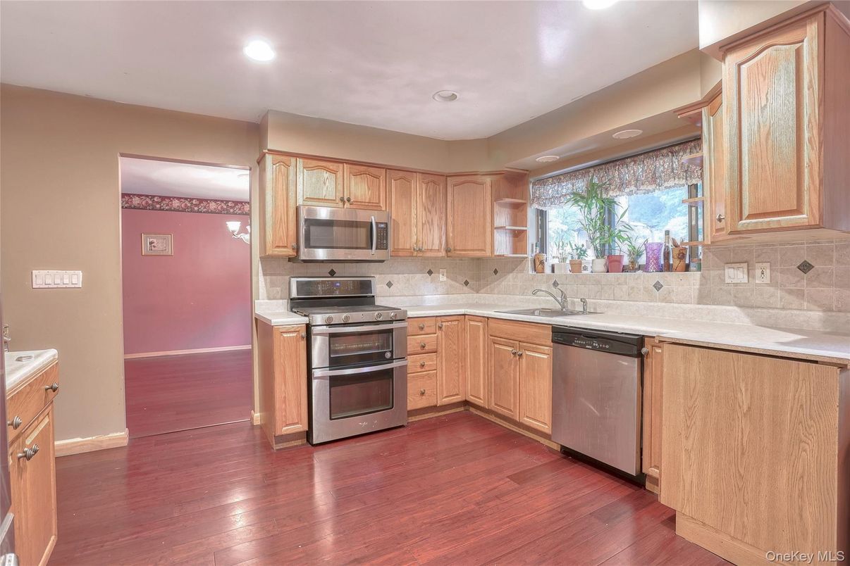 Interior, Kitchen, Recessed Lighting, Stainless Steel Appliances, Wood Texture Flooring