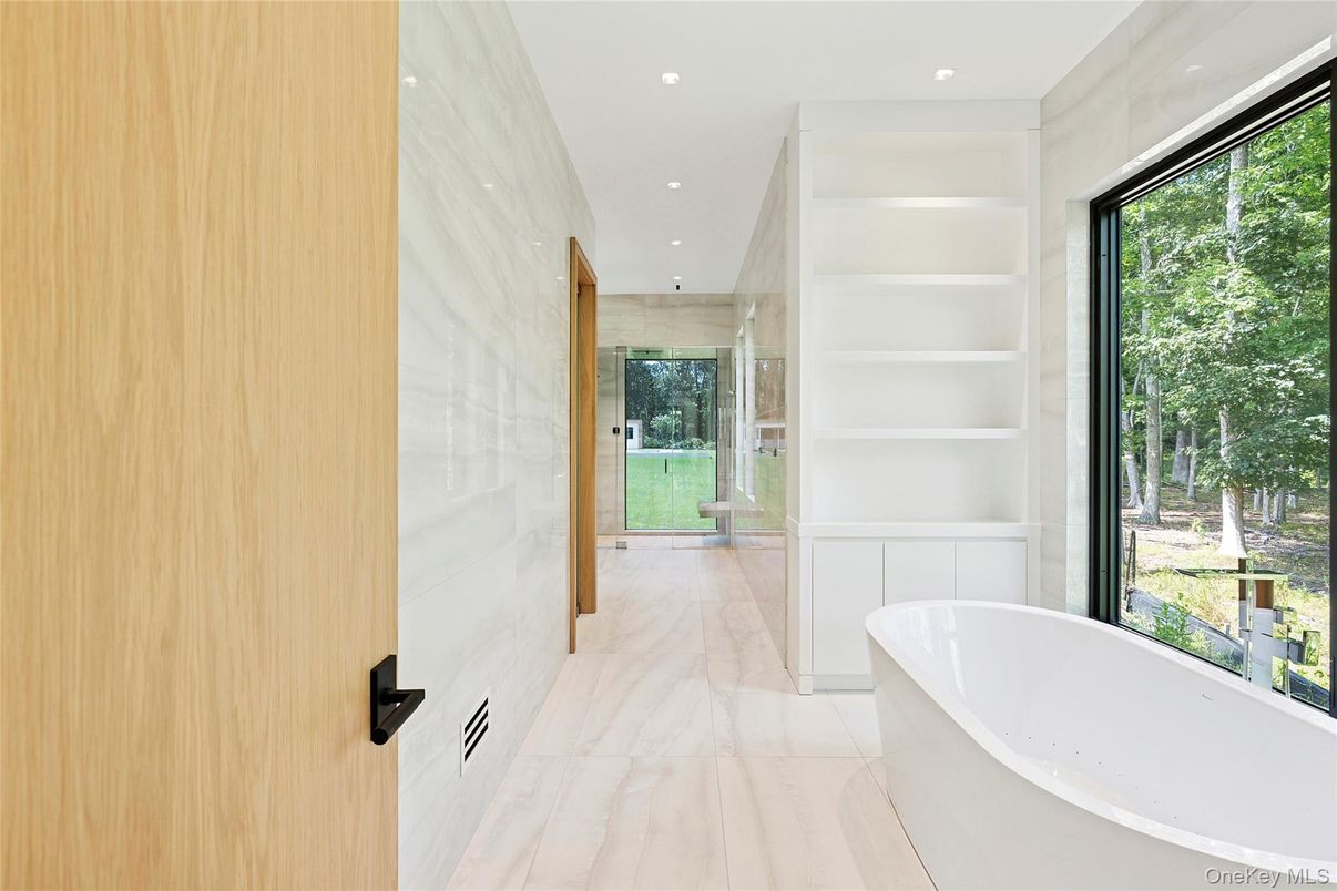 Bathroom, Free Standing Baths, Glass Shower, Interior, Marble, Marble Walls, Recessed Lighting