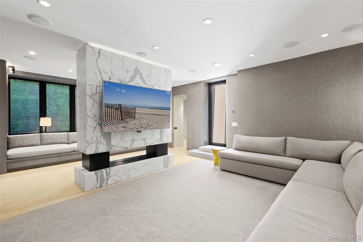 Fireplace, Interior, Living room, Marble Walls, Recessed Lighting, Wood Texture Flooring