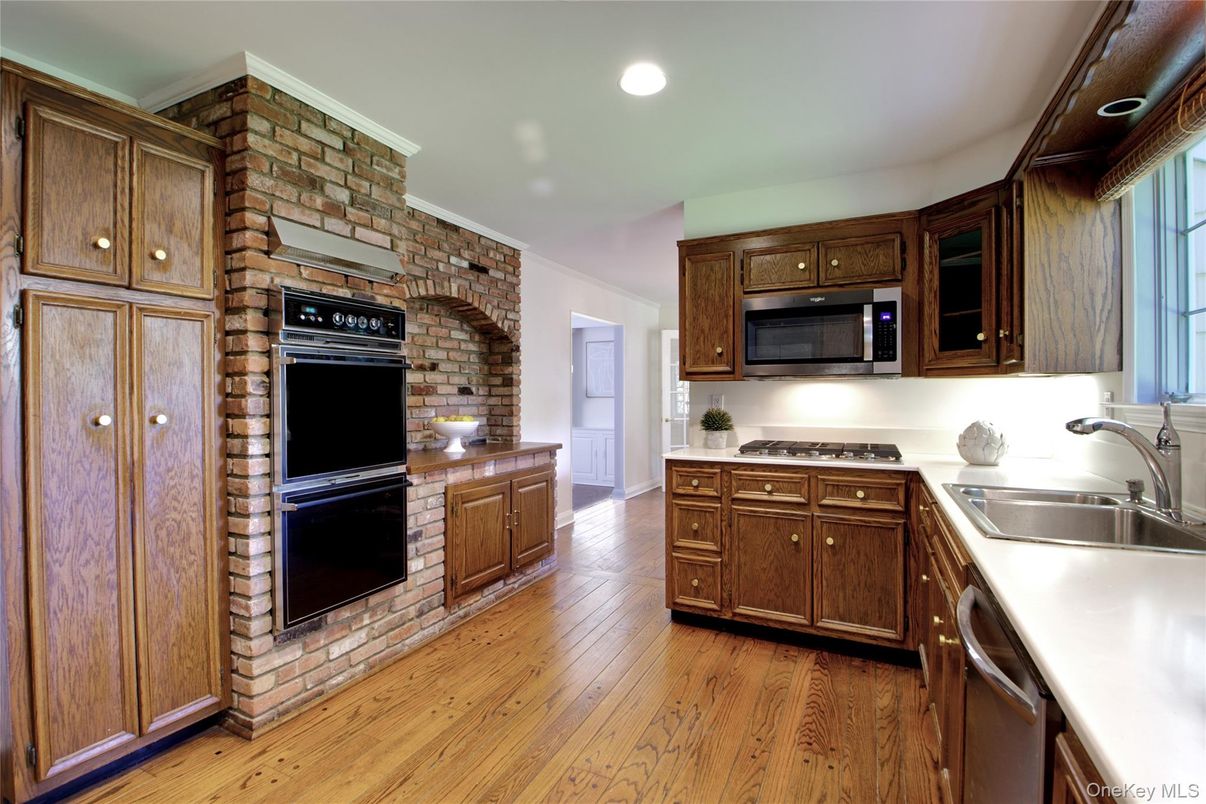 Interior, Kitchen, Recessed Lighting, Stainless Steel Appliances, Stone Walls, Wood Texture Flooring