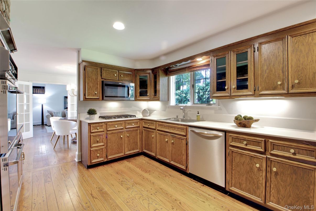 Dining room, Interior, Kitchen, Recessed Lighting, Stainless Steel Appliances, Wood Texture Flooring
