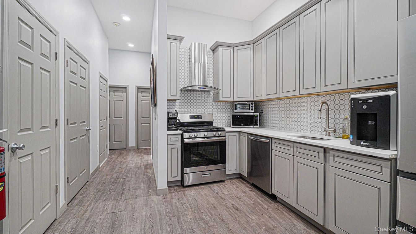 Interior, Kitchen, Recessed Lighting, Stainless Steel Appliances, Wood Texture Flooring