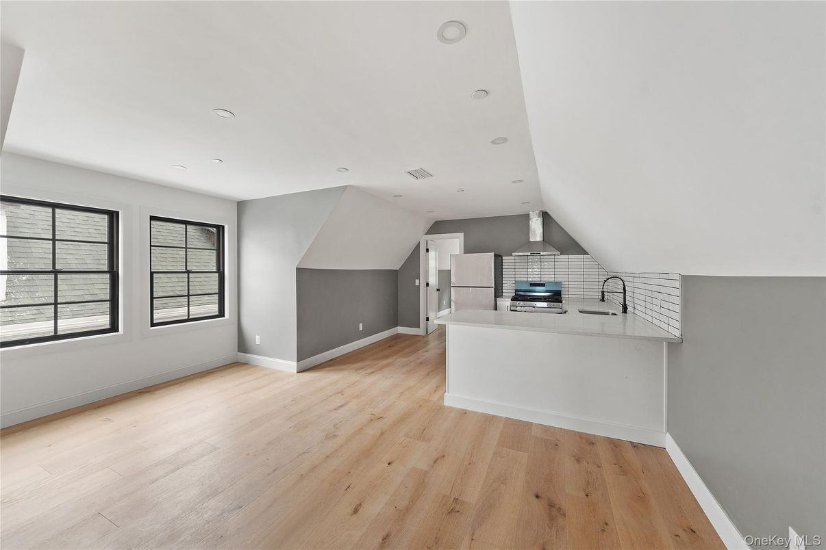 Empty room, Fireplace, Interior, Kitchen, Recessed Lighting, Wood Texture Flooring