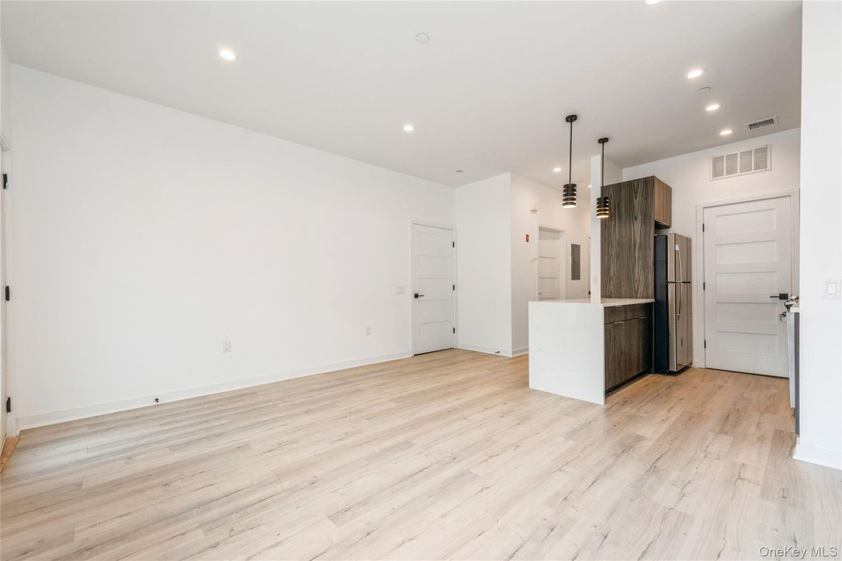 Empty room, Interior, Kitchen, Pendant Lights, Recessed Lighting, Wood Texture Flooring