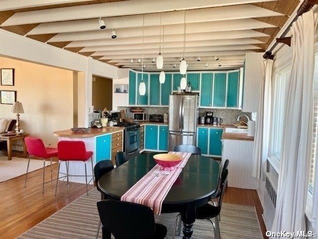 Dining room, Interior, Kitchen, Pendant Lights, Stainless Steel Appliances, Wood Texture Flooring