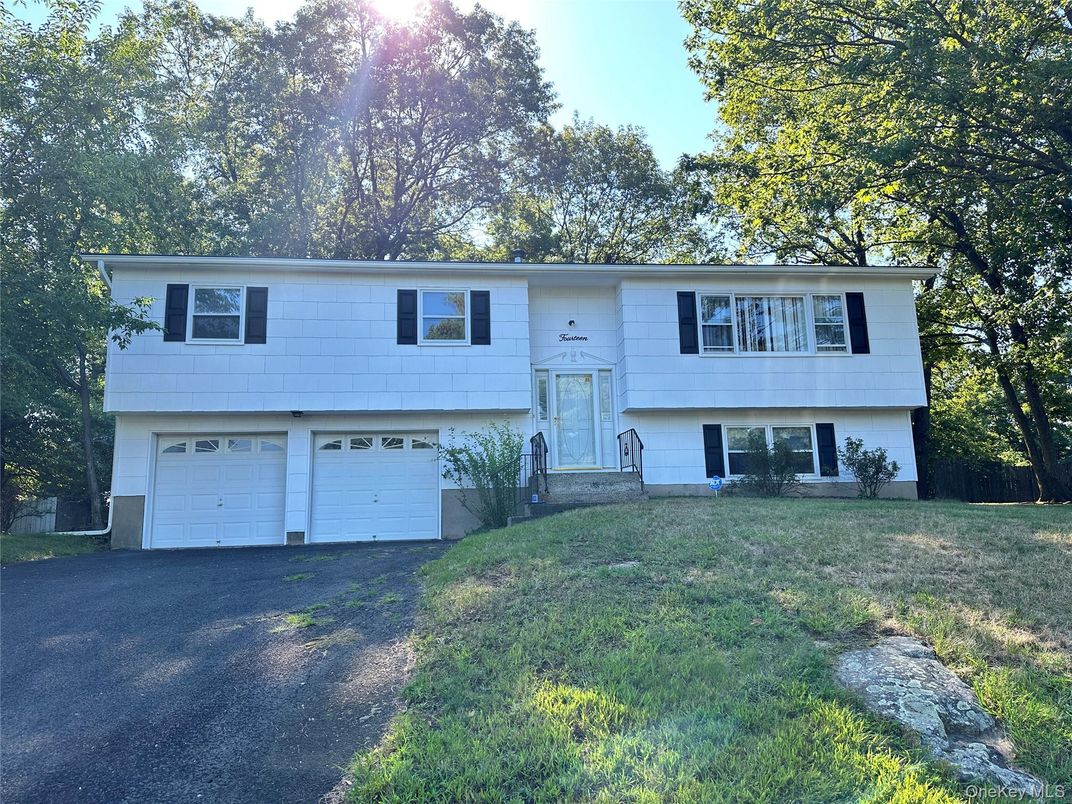 Attached, Exterior, Facade, Raised Ranch