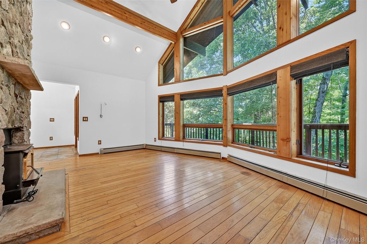 Empty room, Fireplace, Interior, Recessed Lighting, Wooden Beams, Wood Texture Flooring