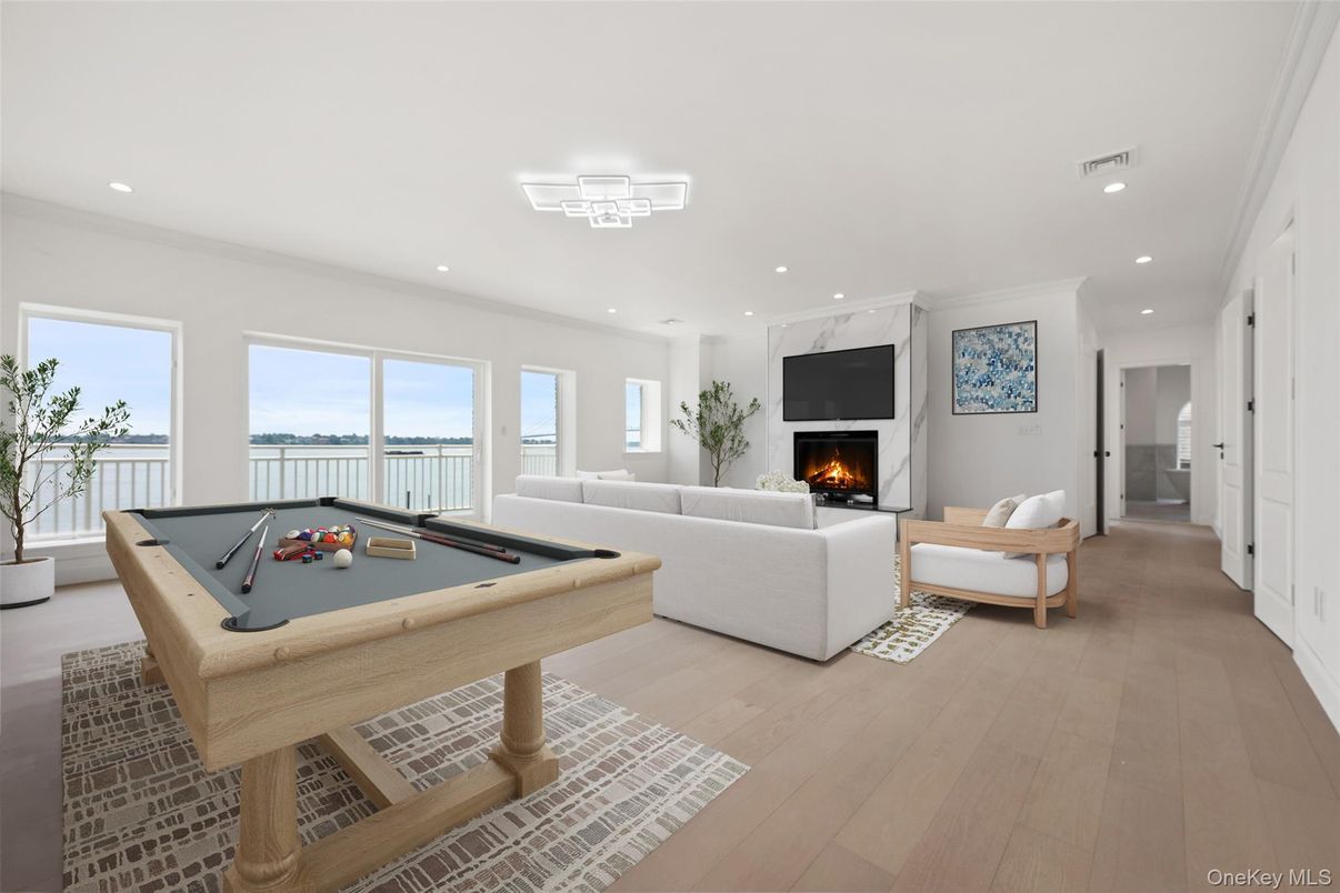 Billiard Table, Fireplace, Game Room, Interior, Living room, Recessed Lighting, Wood Texture Flooring