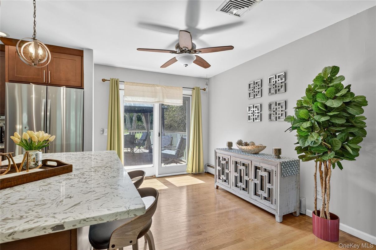 Dining room, Interior, Kitchen, Pendant Lights, Stainless Steel Appliances, Wood Texture Flooring