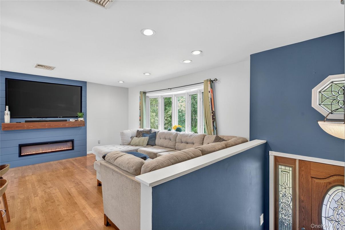 Fireplace, Interior, Living room, Recessed Lighting, Wood Texture Flooring