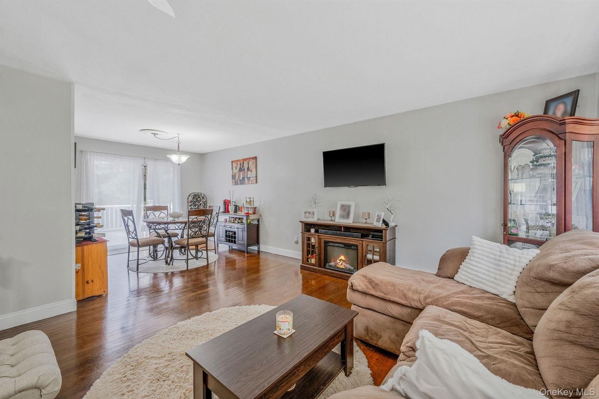 Dining room, Fireplace, Interior, Living room, Wood Texture Flooring