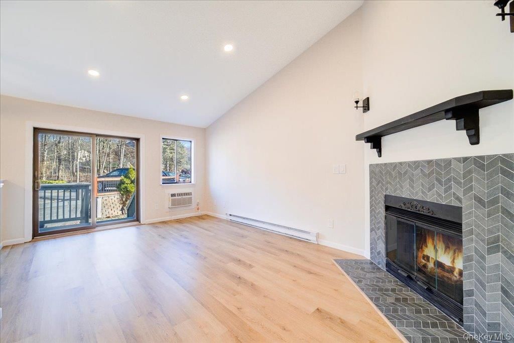 Empty room, Fireplace, Interior, Recessed Lighting, Wood Texture Flooring