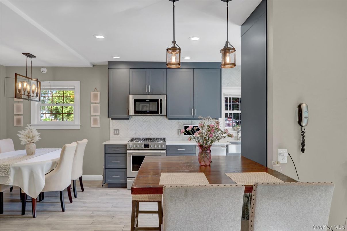 Dining room, Interior, Kitchen, Pendant Lights, Recessed Lighting, Stainless Steel Appliances, Wood Texture Flooring