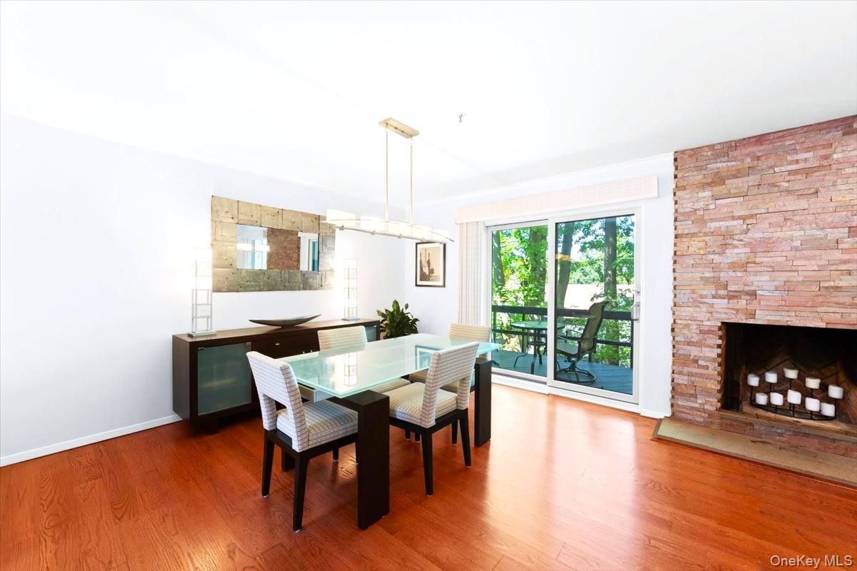 Dining room, Fireplace, Interior, Pendant Lights, Stone Walls, Wood Texture Flooring