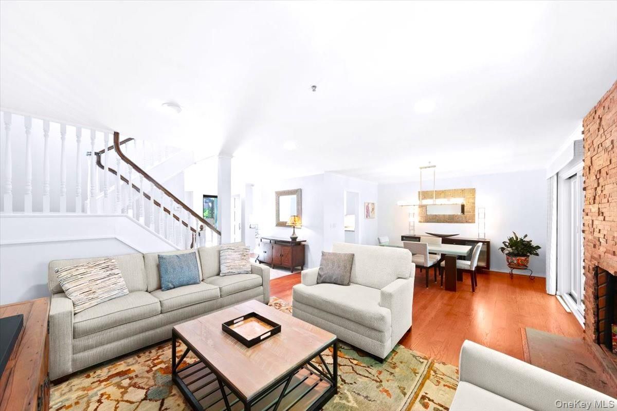 Dining room, Fireplace, Interior, Living room, Pendant Lights, Stone Walls, Wood Texture Flooring