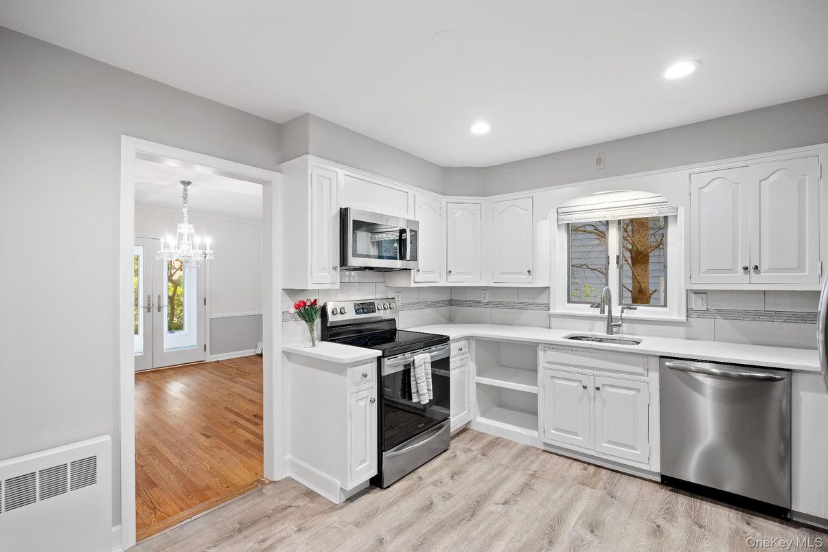 Chandelier, Interior, Kitchen, Recessed Lighting, Stainless Steel Appliances, Wood Texture Flooring
