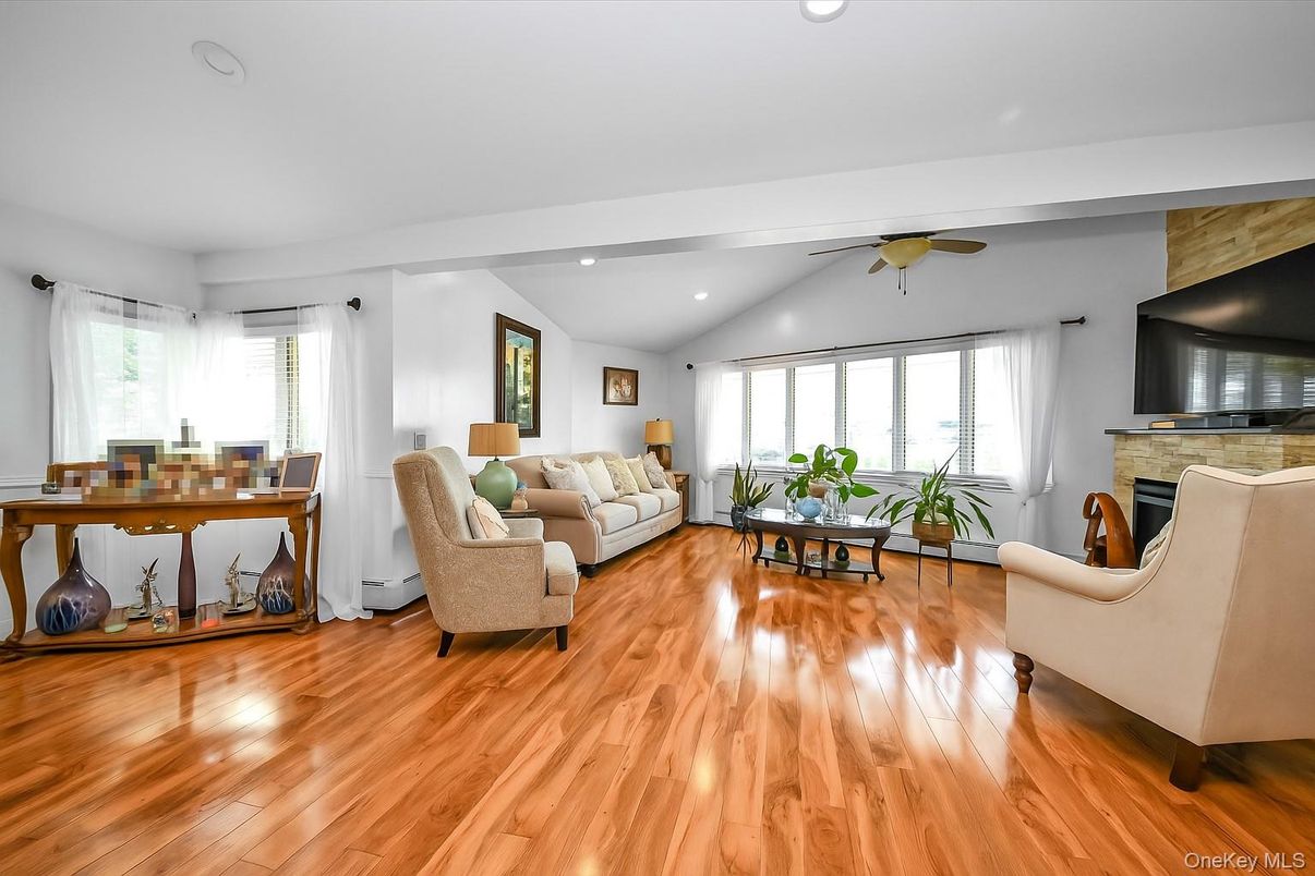 Dining room, Fireplace, Interior, Living room, Recessed Lighting, Wood Texture Flooring
