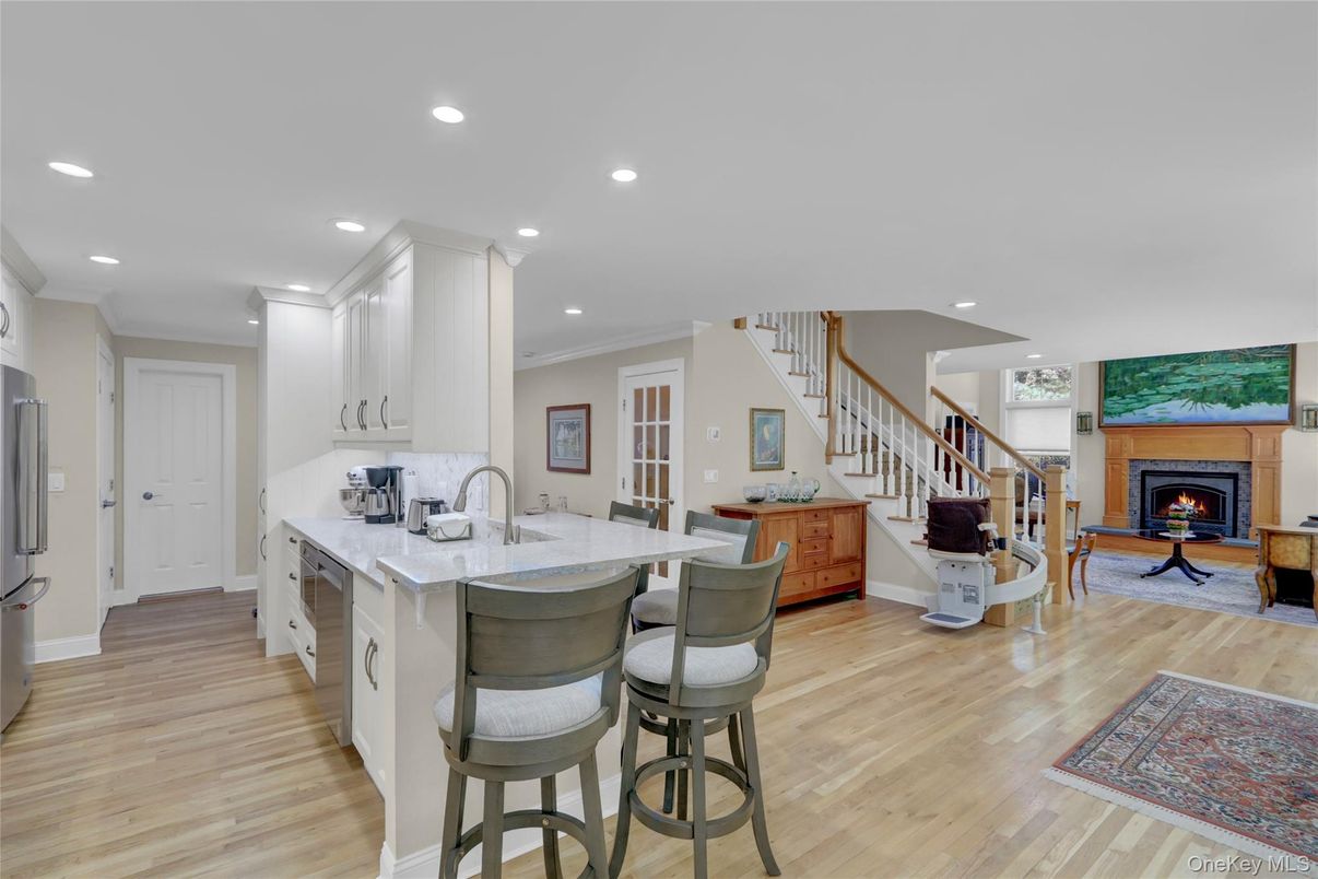 Fireplace, Interior, Kitchen, Living room, Recessed Lighting, Wood Texture Flooring