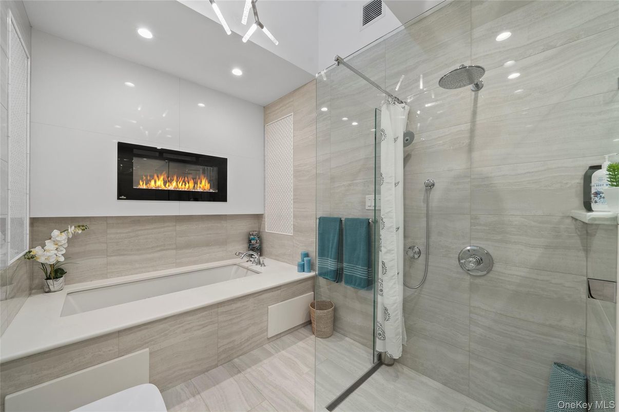 Bathroom, Fireplace, Glass Shower, Interior, Recessed Lighting