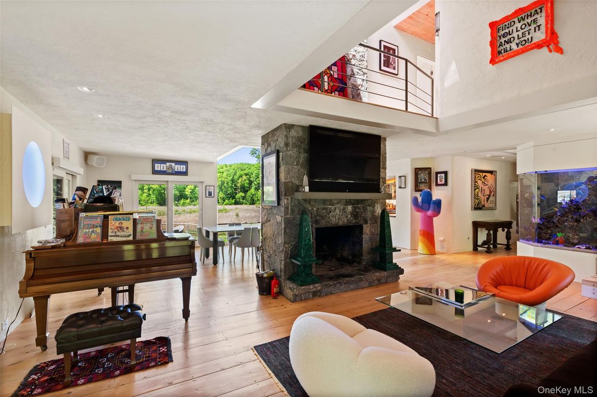 Fireplace, Interior, Living room, Piano, Recessed Lighting, Wood Texture Flooring