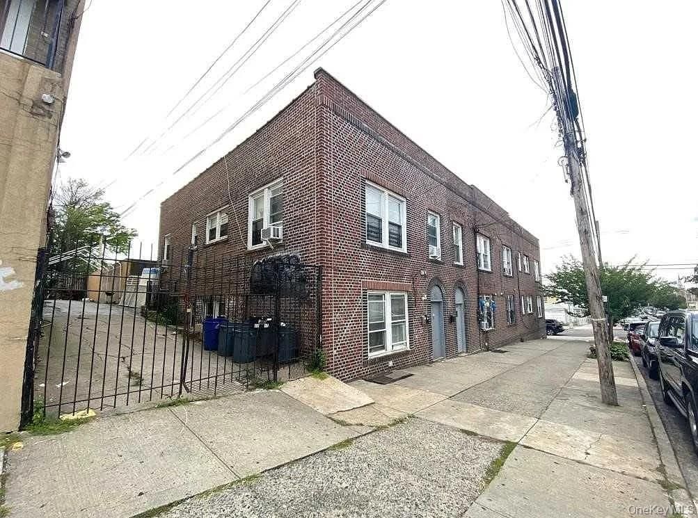Exterior, Facade, Brick Facade, Condo Building