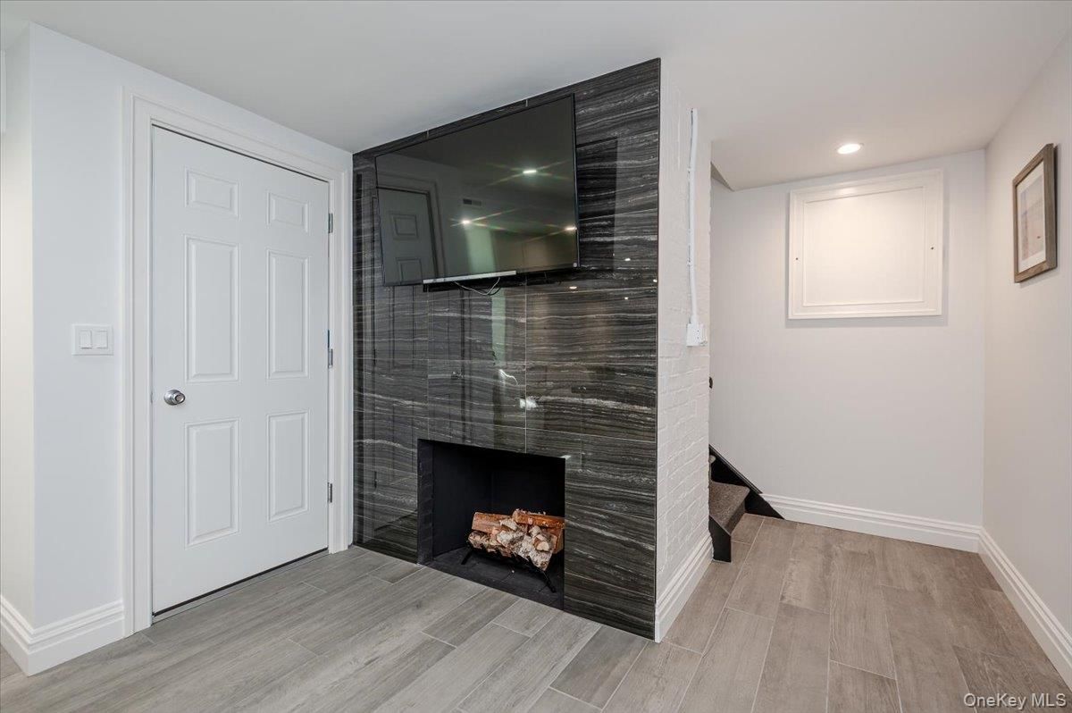 Fireplace, Interior, Recessed Lighting, Wood Texture Flooring