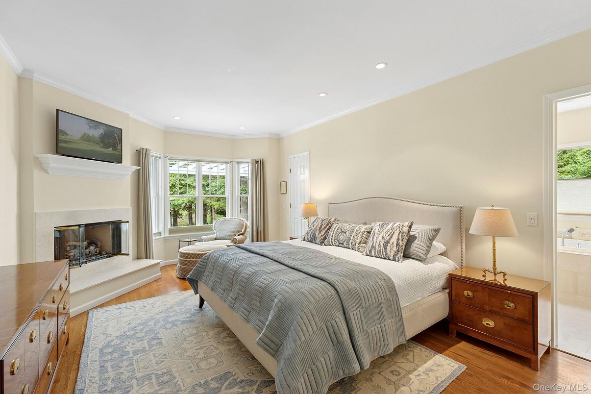 Bedroom, Fireplace, Interior, Recessed Lighting, Wood Texture Flooring
